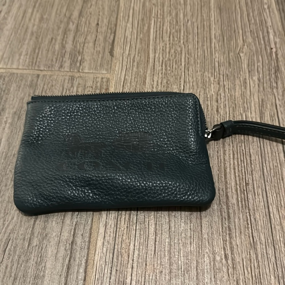 “Coach” wristlet- not sure that it is real, selling for cheap
